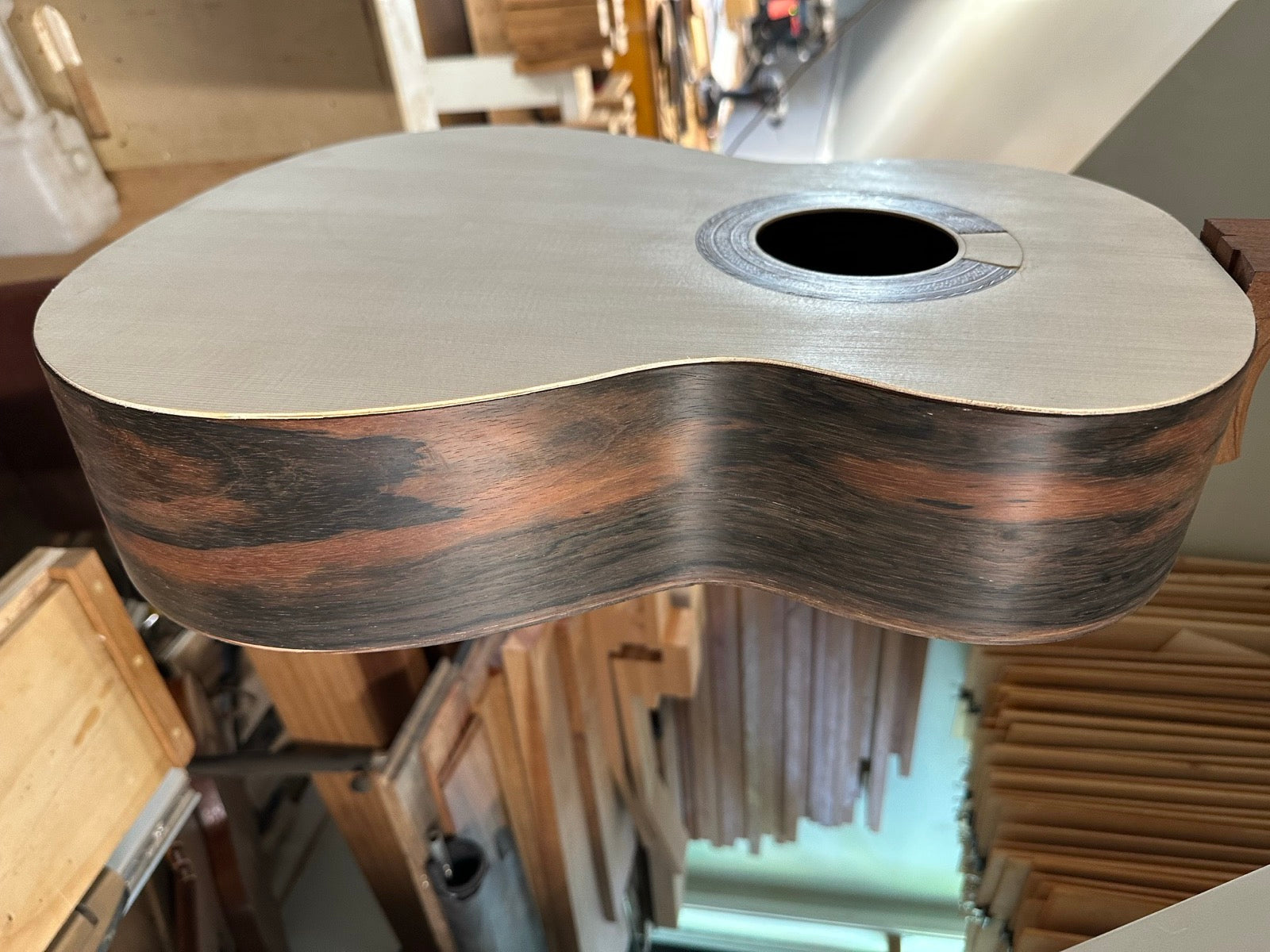 The Brazilian rosewood rim, in the white