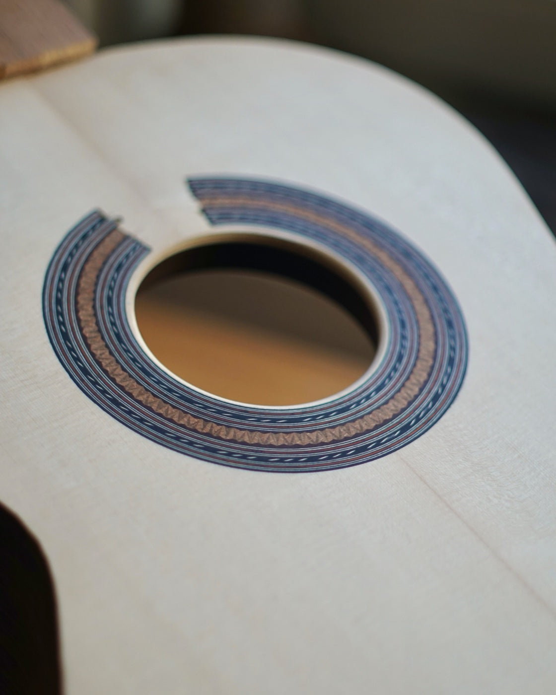 The rosette, set into the raw soundboard