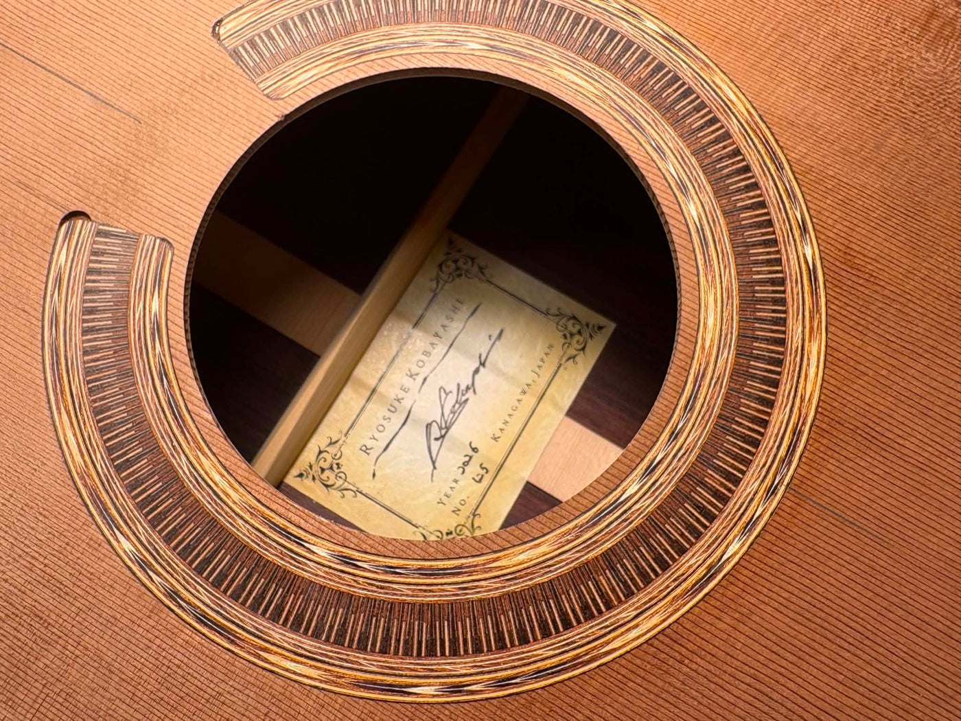 The label, signed for No. 125