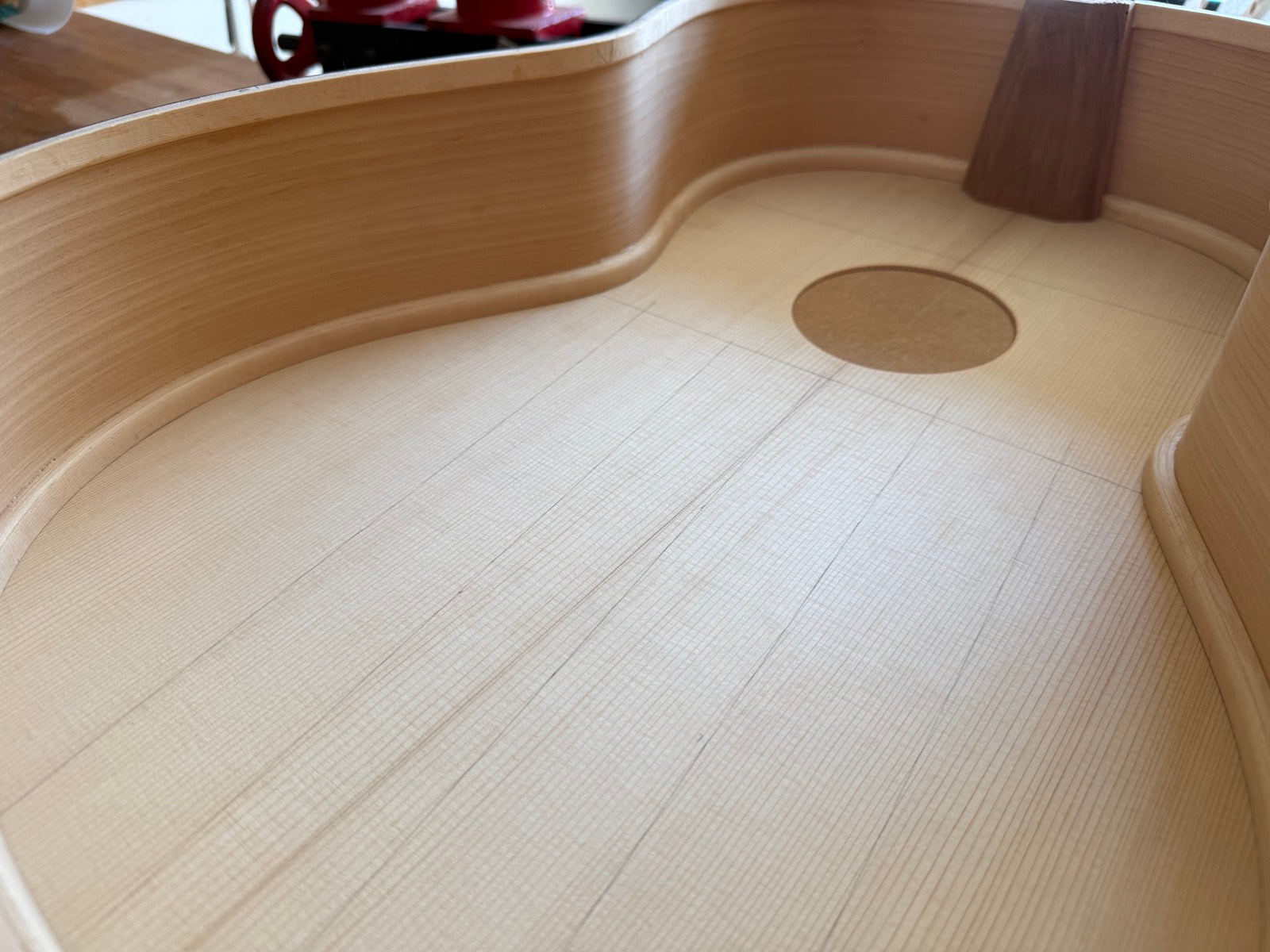 The spruce top laid out in pencil, awaiting its braces